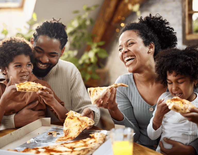 Pizza Night - Family enjoys fresh slices