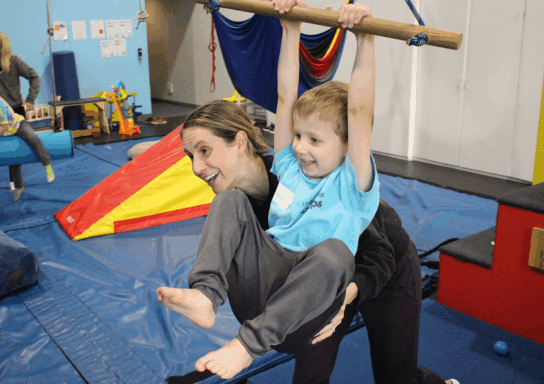 Pediatric Physical Therapy in Chicago - Therapist and Child ziplining