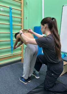 Therapist takes a closer look and child's spine